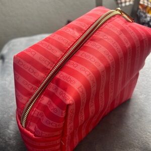 Cute little spacious pink makeup Bebe bag